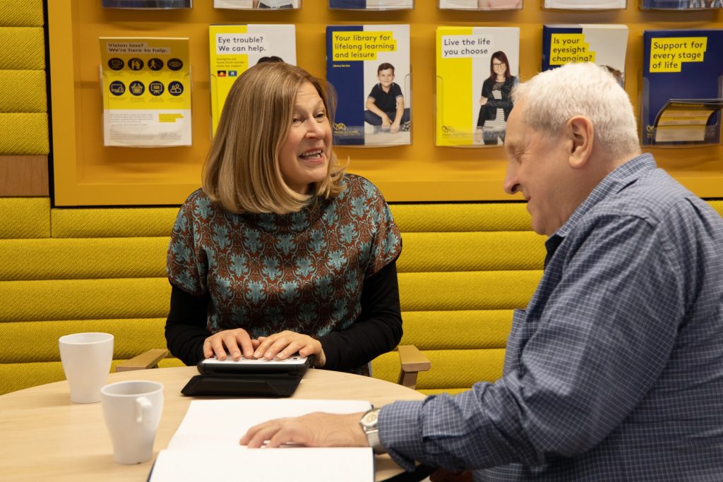 People using adaptive technologies to help with reading.