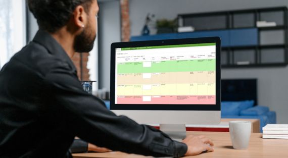 Photo of a grant seeker using Strategic Grants GEMS grants portal to find grants available for nonprofits